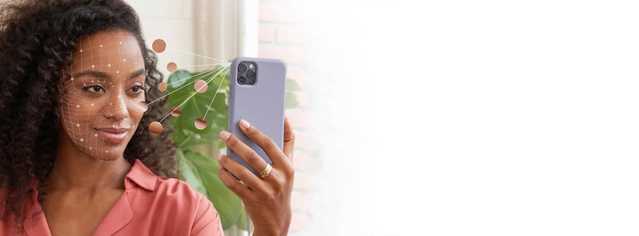 Women holding phone towards face to use Neutrogena Skin360 Application